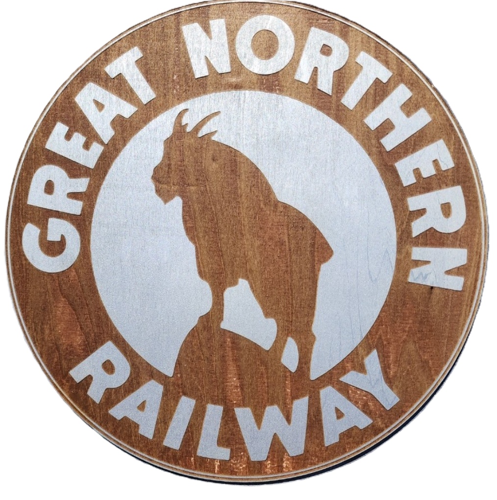 Circular logo of Great Northern Railway with a silhouette of a goat on a wooden background