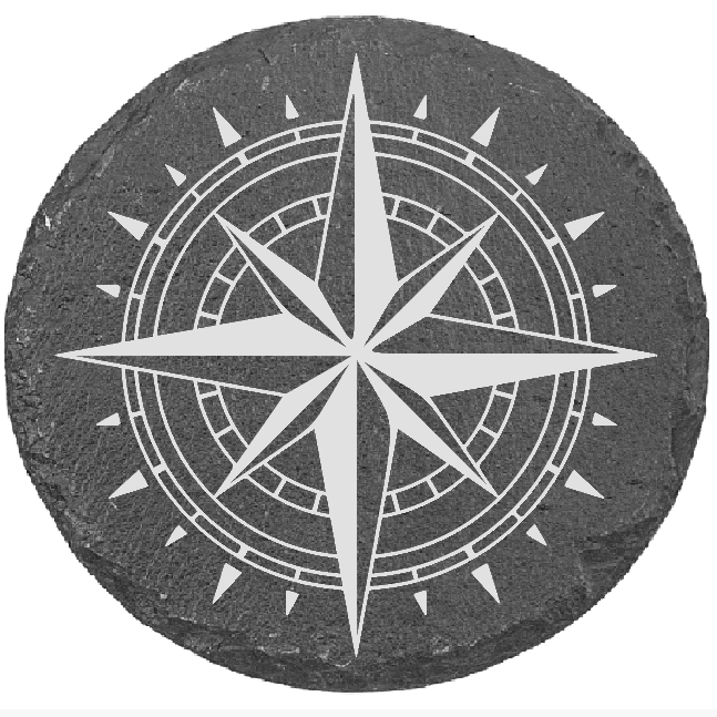 Black stone coaster with white compass rose design on a white background
